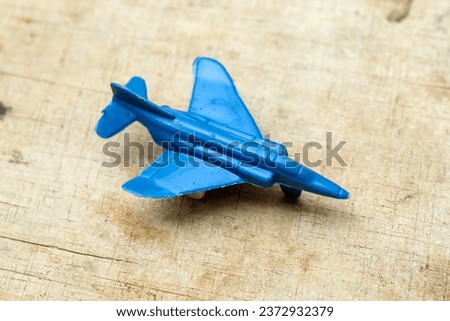 Blue children's toy fighter plane. children. toy plane