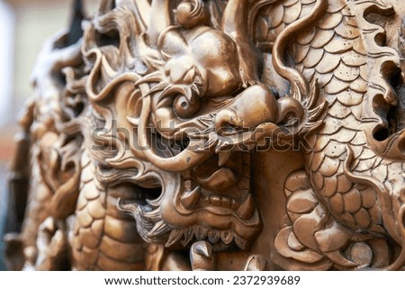 Close-up of exquisite mahogany dragon sculpture