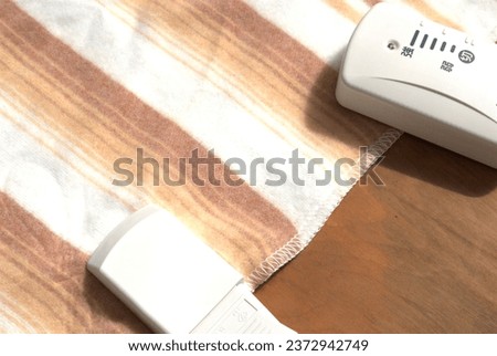 winter heating equipment. An electric blanket that heats up quickly when you turn it on.