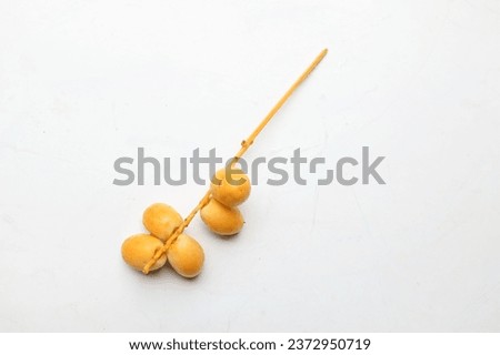 top view and flat lay fresh palm Phoenix dactylifera or Date palm fruit isolated on the white background