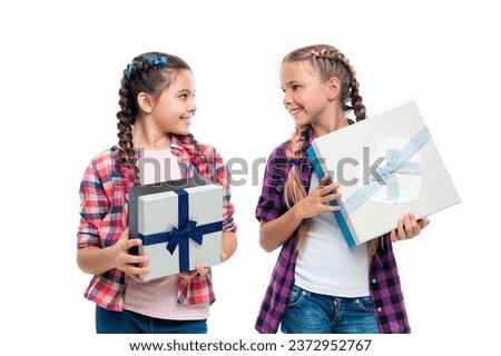 children girls with boxes. happy birthday. birthday present box. children girls sharing present. present to friend. present box from shopping. good occasion