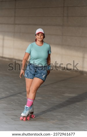  Roller skater woman with summer clothes and cap skating down a street on a sunny day.