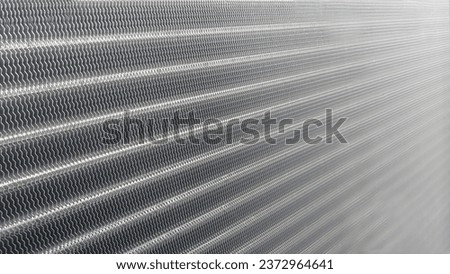 "An Exquisite Coil Evaporator Background Texture, Ideal for Elevating Your Design Projects with its Detailed Patterns and High-Resolution Clarity, Adding a Touch of Sophistication to Your Artwork." Royalty-Free Stock Photo #2372964641