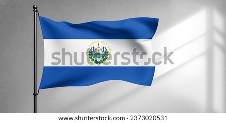 El Salvador national flag cloth fabric waving on beautiful sky Background.