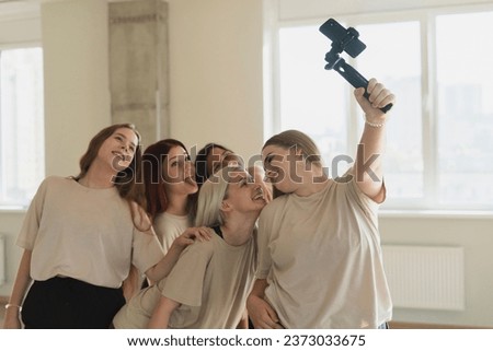 group of young female friends doing a selfie in the dance studio on a practice session 