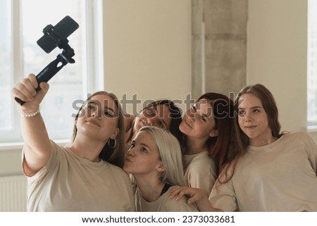 group of young female friends doing a selfie in the dance studio on a practice session 