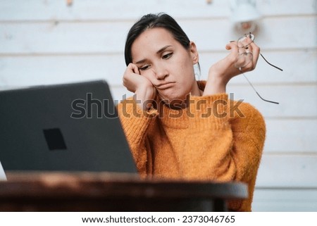 Beauitul young woman working using computer laptop concentrated High quality photo