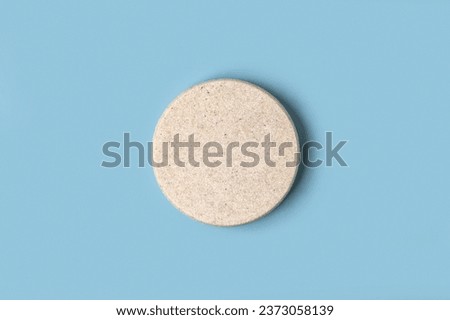 Round Podium on Blue Background. Natural Marble Pedestal. Eco Beauty Product Mockup promotion. Scene to Show. Stone Showcase, Display Case. Top View Soft Shadow Flat Lay. Trendy Cian Color Space. Spa Royalty-Free Stock Photo #2373058139