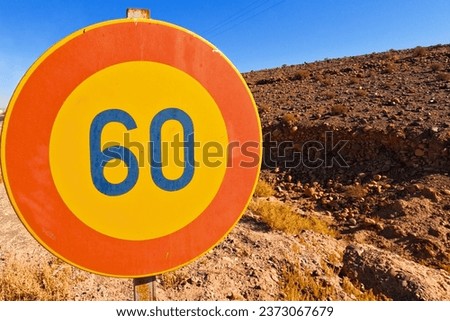 Speed Limit 60 Road Sign in the Desert