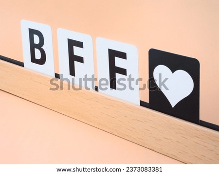 sign for BEST Friends forever with the letters bff and a heart.