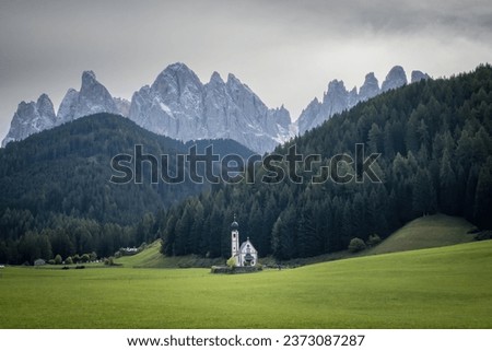 St. John's Chapel in Ranui, Santa Maddalena, Funes Valley, South Tyrol, Italy in front of Odles group mountains (germ. Geislergruppe) Royalty-Free Stock Photo #2373087287