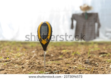 Use soil PH meter for check the PH value in farm