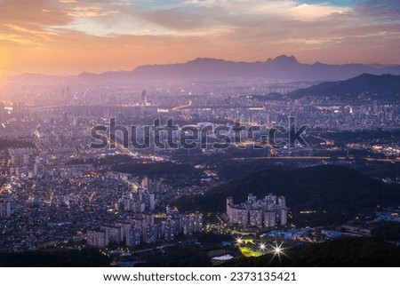 Aerial view of Seoul And there is Bukhansan Mountain in the background, South Korea. Royalty-Free Stock Photo #2373135421