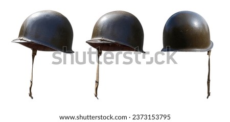 Vintage World War II United States army helmet at various angles isolated on a white background