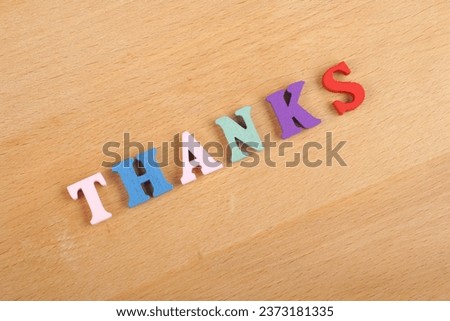 word on wooden background composed from colorful abc alphabet block wooden letters, copy space for ad text. Learning english concept Royalty-Free Stock Photo #2373181335
