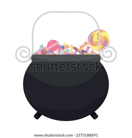 Halloween cauldron with sweets on white background