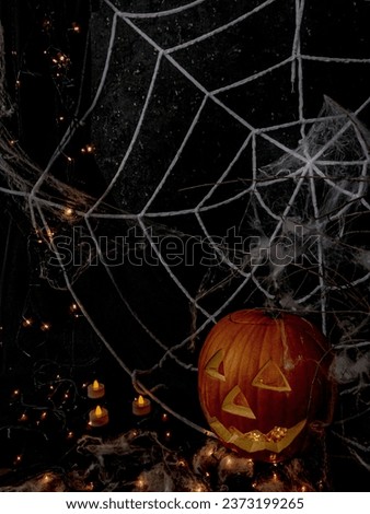 Carved Halloween Pumpkin with White Spider Web with Candles Royalty-Free Stock Photo #2373199265
