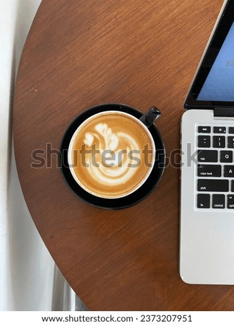 Coffee latte with laptop flat lay photography