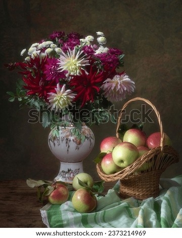 Still life with autumn bouquet and apples