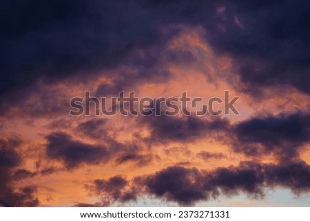 Beautiful orange-purple clouds in the sky