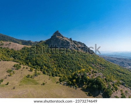Aerial panoramic view of Okros Tsikhe (The golden fortress), a 16th century fortress located in the historical Kvabliani valley, Adigeni Municipality in Georgia's southern region of Samtskhe-Javakheti