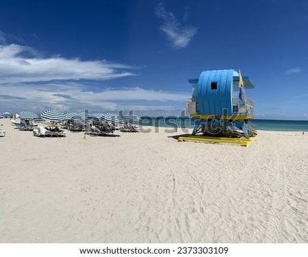 Blue and yellow traditional lifegard tower on South Beach in Miami. Iconic images that represented the emerging cultural and urban revitalization of South Beach in the 1990’s.