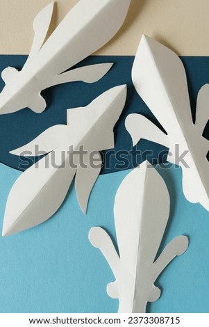 white paper shapes on light and dark and beige paper background Royalty-Free Stock Photo #2373308715