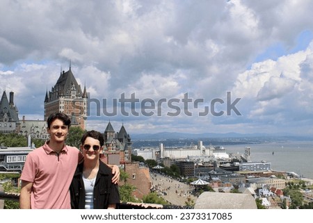 Tourists take pictures at the Frontenac Castle in Old Quebec City, Canada.