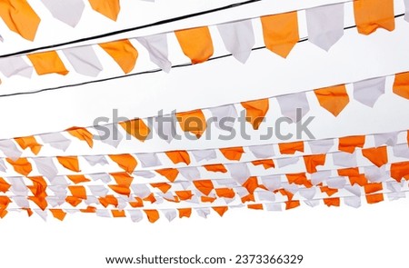 Orange and white festive flags isolated on white background.