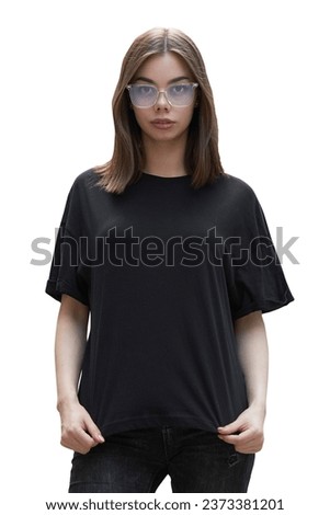 Woman or girl wearing black blank cotton t-shirt with space for your logo, mock up or design
