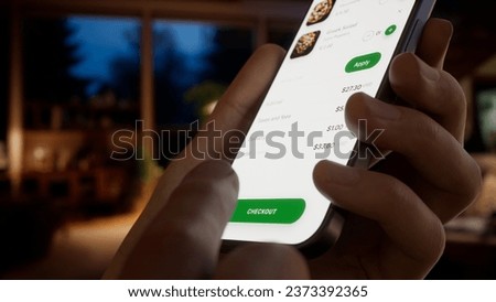 EXTREME CU Caucasian man using fictional food delivery application to make an order Royalty-Free Stock Photo #2373392365