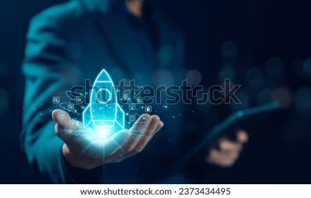 Businessman and rocket start flying up and network line connection. Startup concept strategy launch Startup growth, plan development business project digital technology idea of leadership Royalty-Free Stock Photo #2373434495