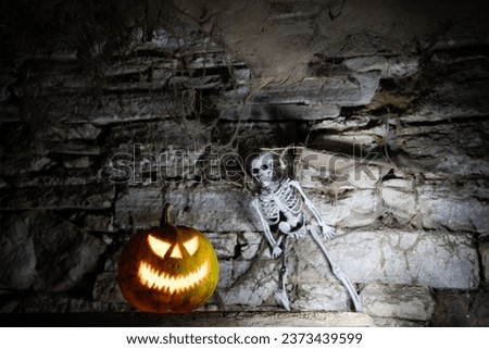scary Halloween background with Jack'o'lanterns and skeleton