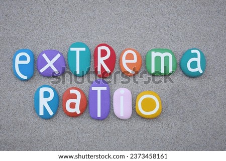 Extrema ratio is a Latin expression whose literal meaning is, extreme plan, ultimate, composed with multi colored stone letters over beach sand