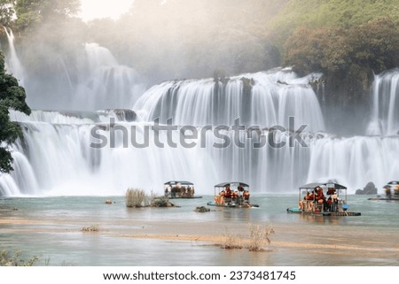 view of Detian or Ban Gioc waterfall, Cao Bang, Vietnam. Ban Gioc waterfall is one of the top 10 waterfalls in the world. Travel and landscape concept. Royalty-Free Stock Photo #2373481745