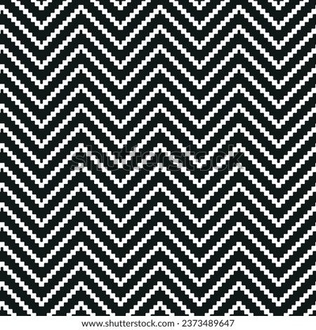 Seamless repeating pattern. Chevron design with zigzag black stripes on a white background. Geometric striped texture. Vector illustration for fabric, textile, and print. Royalty-Free Stock Photo #2373489647