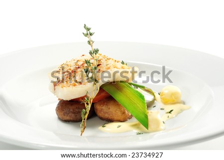 Halibut on Vegetable with Sauce. Isolated on White Background