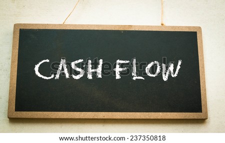 cash flow concept on board 