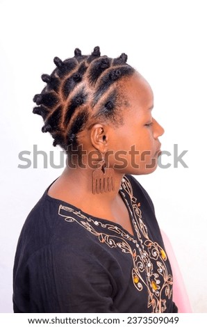 Random casual Bantu Knots natural hairstyle Royalty-Free Stock Photo #2373509049