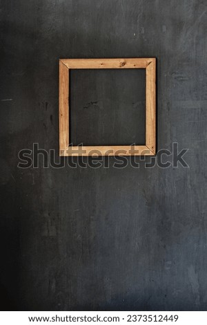 abstract background, the background of this wall has a dark gray texture with wooden frame ornaments

￼


