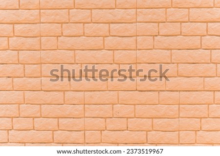 wall cladding yellow panels with brick texture. 