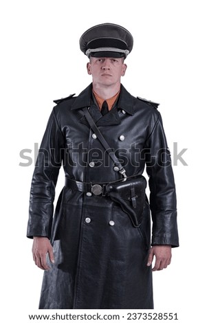 Male actor reenactor in historical uniform as an officer of the German Army during World War II Royalty-Free Stock Photo #2373528551