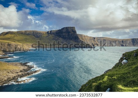 Isle of Skye is the largest island in the Inner Hebrides. It lies just off the west coast of mainland Scotland in the Atlantic Ocean.
Beautiful solitude in a quiet atmosphere without people. Royalty-Free Stock Photo #2373532877