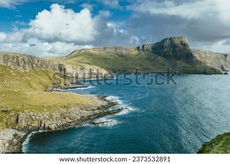 Isle of Skye is the largest island in the Inner Hebrides. It lies just off the west coast of mainland Scotland in the Atlantic Ocean.
Beautiful solitude in a quiet atmosphere without people. Royalty-Free Stock Photo #2373532891