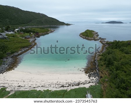 Beautiful beach in nothern norway. Camping spot where was best views to ocean see. Ocean was clear, cold and salty. Picture is taken from air. High angle view. Best place for road trip.