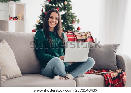 Photo of sweet cute lady dressed knitted x-mas buying presents modern gadget indoors house room