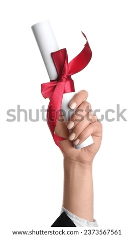 Woman holding diploma with ribbon on white background Royalty-Free Stock Photo #2373567561