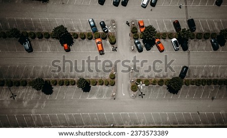 A high-angle shot of the cars in the parking area.
