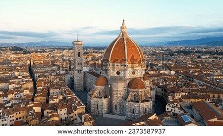 Aerial view of Florence Cathedral (Duomo di Firenze), Cathedral of Saint Mary of the Flower, sunset golden hour, Italy Royalty-Free Stock Photo #2373587937