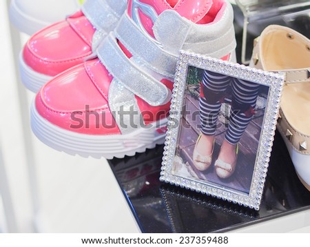 Pink shoes with the shoes in picture frame, soft light process